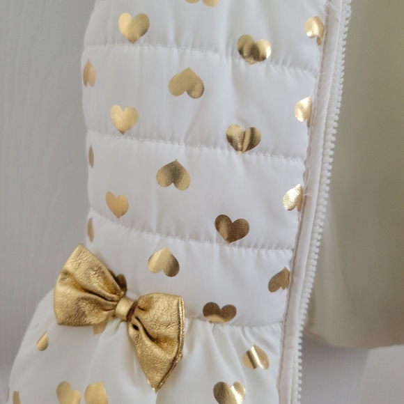 Puffer vests with two little bows in front. Size 24months. - Picture 3 of 4